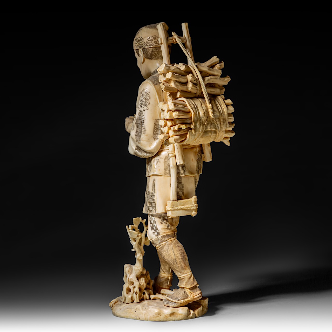 A large Japanese walrus ivory okimono of a wood gatherer drinking from a gourd flask, Meiji period ( - Image 4 of 10
