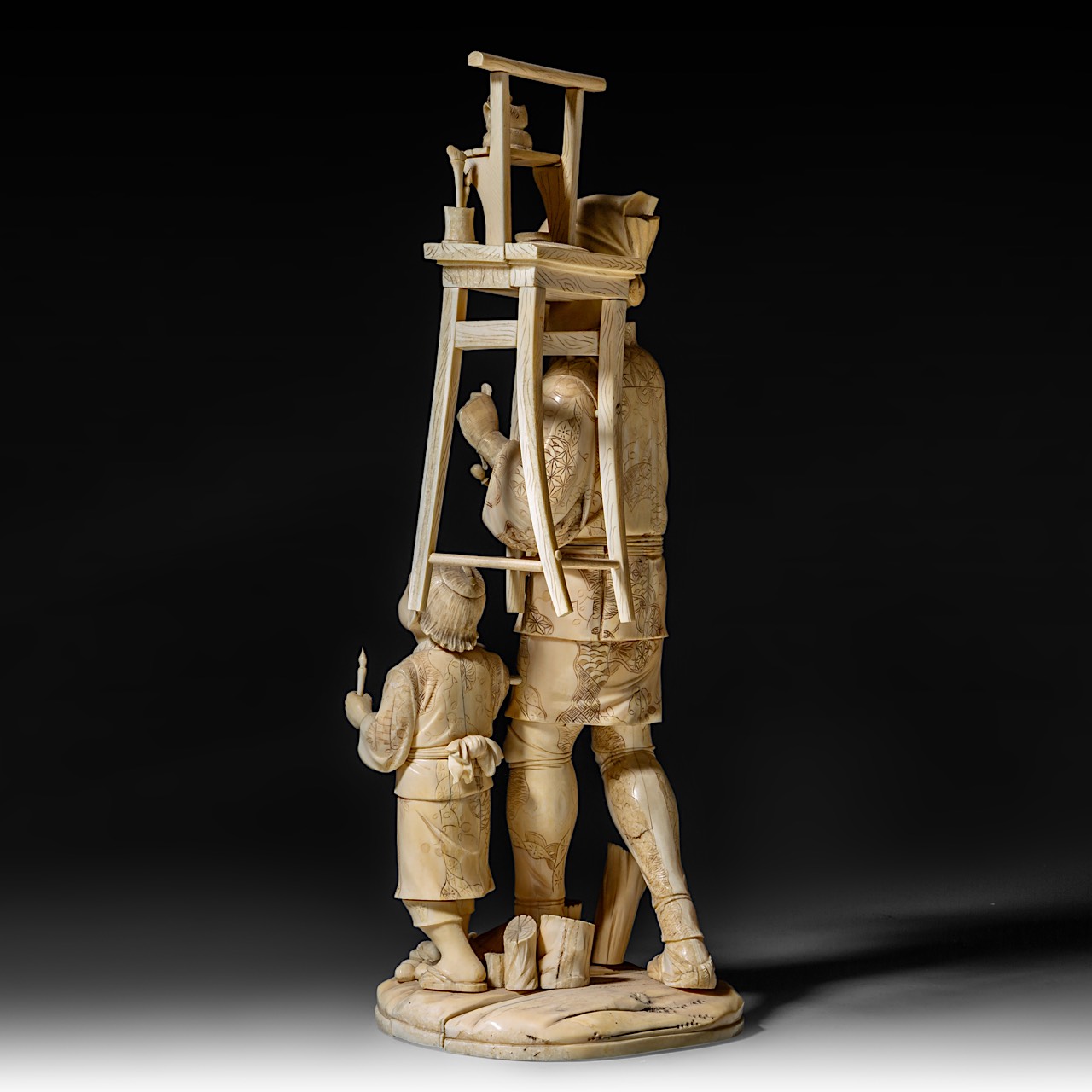 A large Japanese walrus ivory okimono of an artisan with his son, Meiji period (1868-1912), H 46,5 - - Image 4 of 13