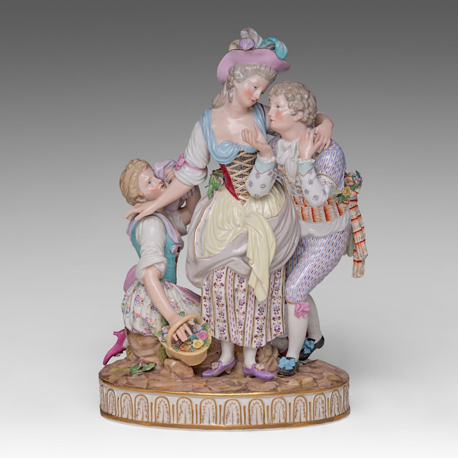 A polychrome Meissen porcelain group with a gallant scene, H 32 cm