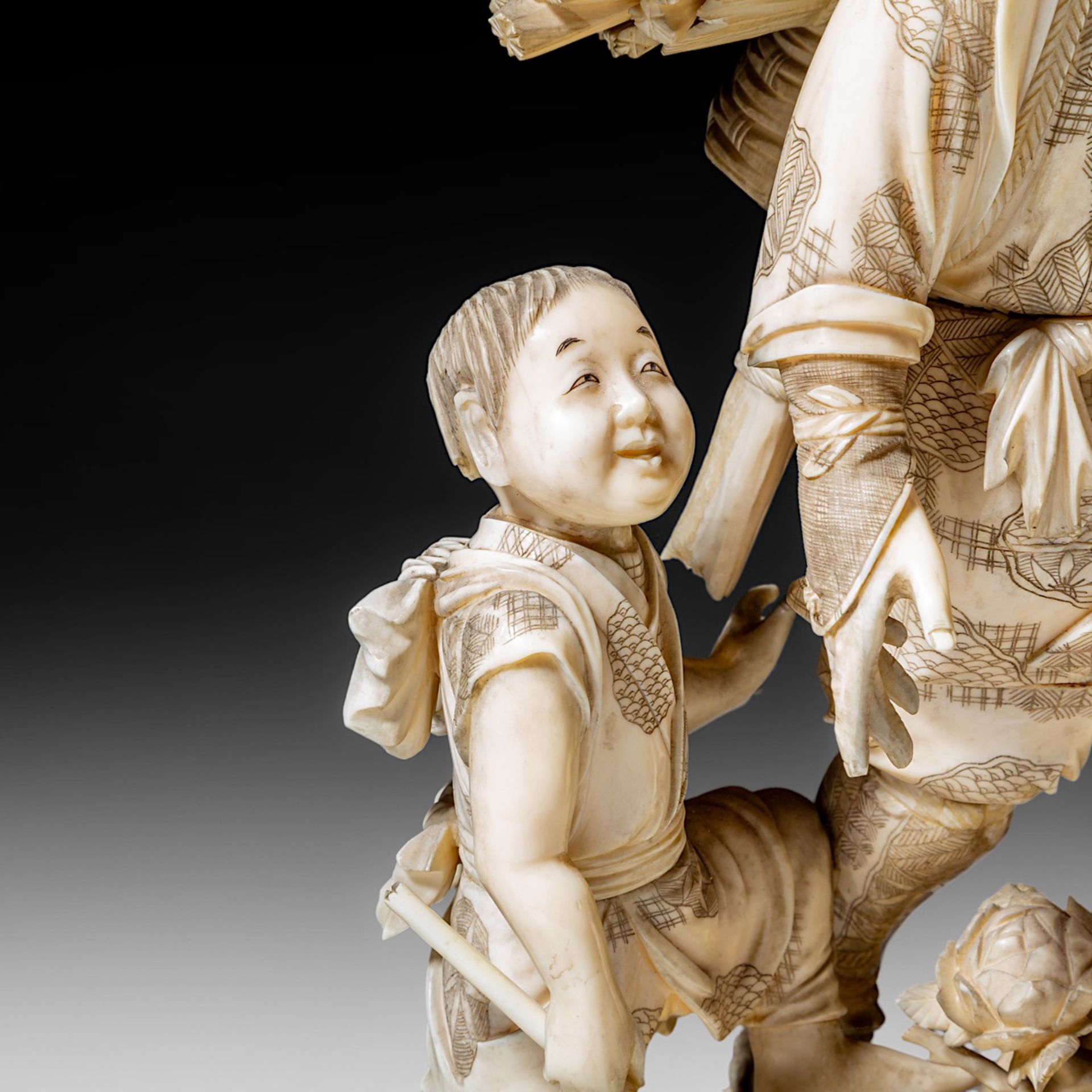 A large and fine Japanese walrus ivory okimono of a falconer and his son watching an eagle, Meiji pe - Image 11 of 13