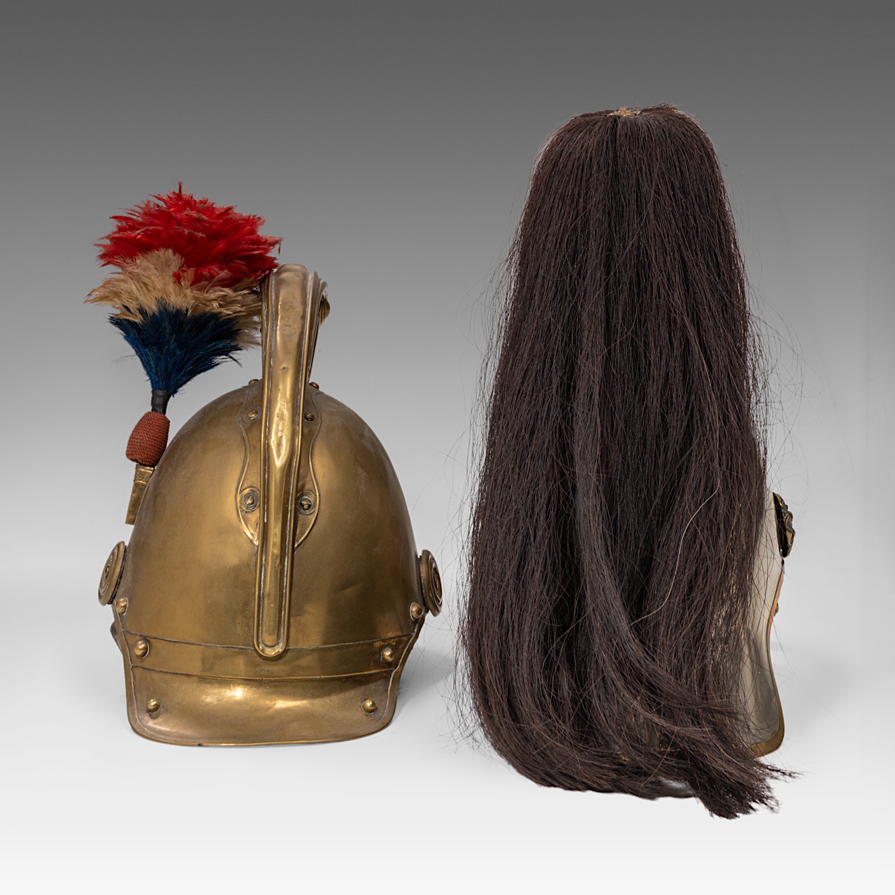 A cuirassier helmet, with black hair tail (French 1854) and another helmet, 19thC, copper and brass - Image 4 of 5