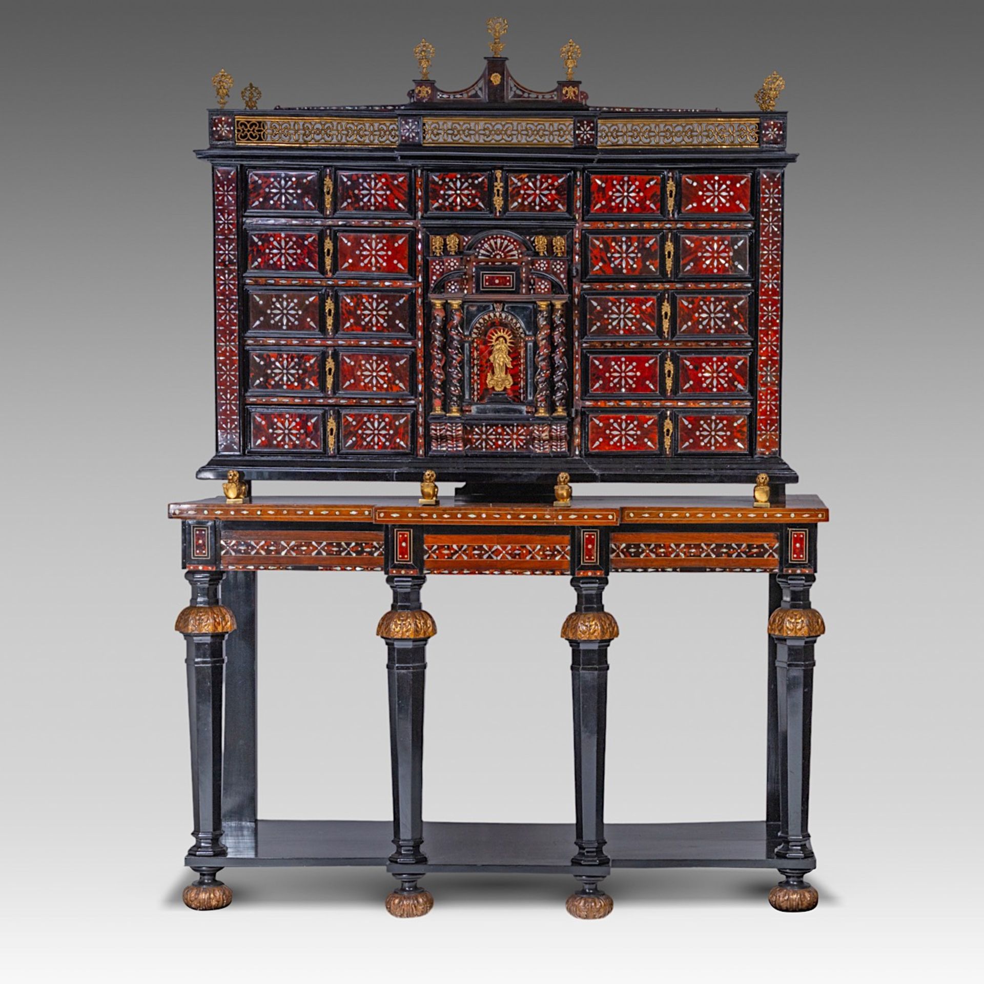 A 17thC cabinet-on-stand, inlaid with tortoiseshell, mother-of-pearl and ivory, H 194 cm (total) (+)