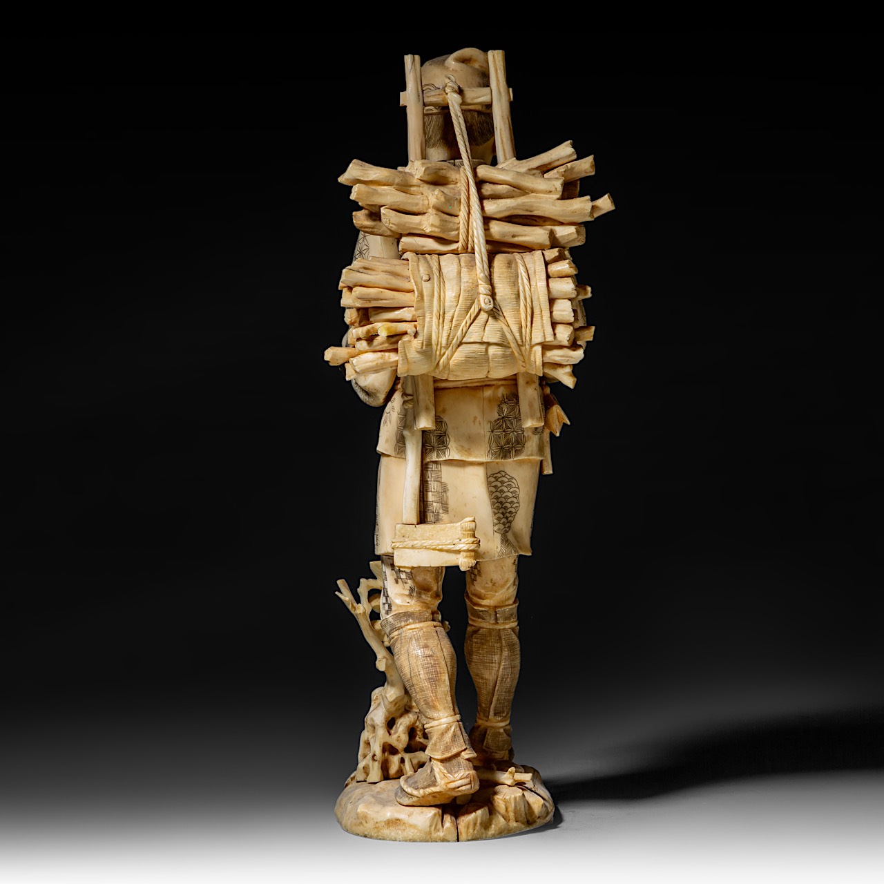 A large Japanese walrus ivory okimono of a wood gatherer drinking from a gourd flask, Meiji period ( - Image 5 of 10