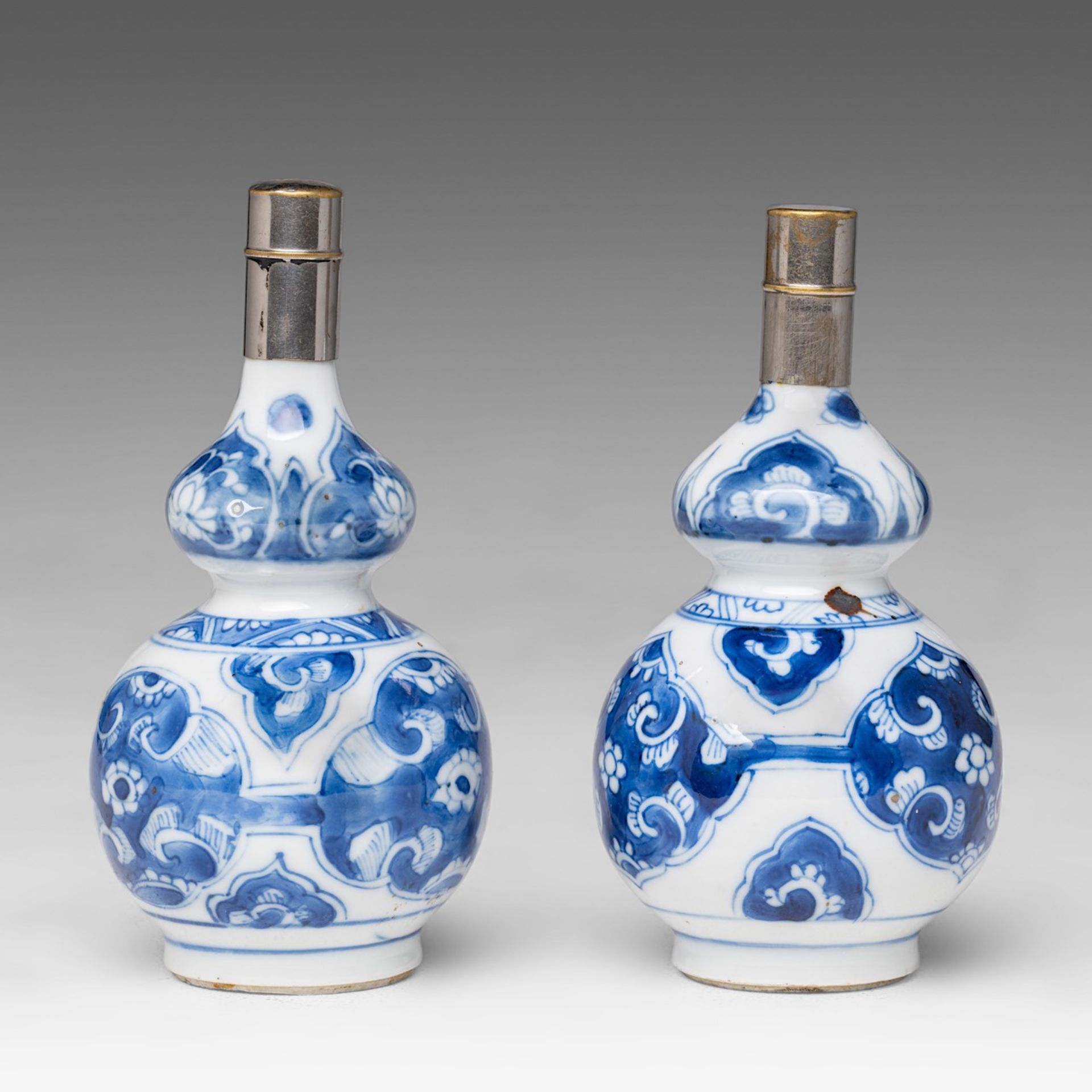 Two Chinese blue and white floral decorated double gourd vases, Kangxi period, H 13 cm - Image 4 of 6