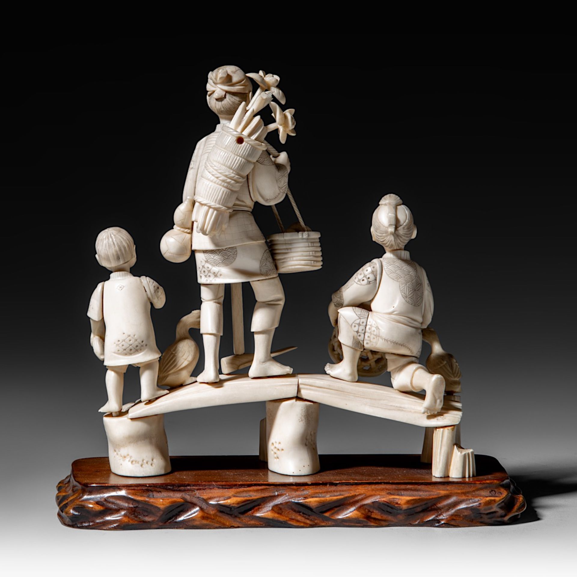 A Japanese hippo and walrus ivory okimono of a family fishing, Showa period (1926-1989), H 20 cm - W - Image 5 of 11