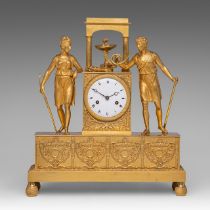 A gilt bronze French Restauration mantle clock with hunting theme, H 40 - W 36 cm