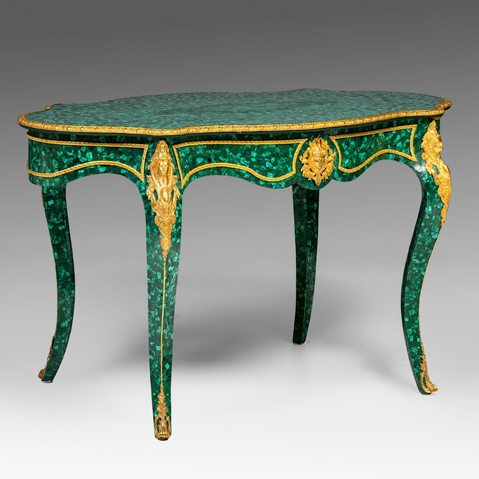 A Napoleon III-style malachite table with gilt bronze mounts, H 138 cm - W 83 cm - D 80 cm