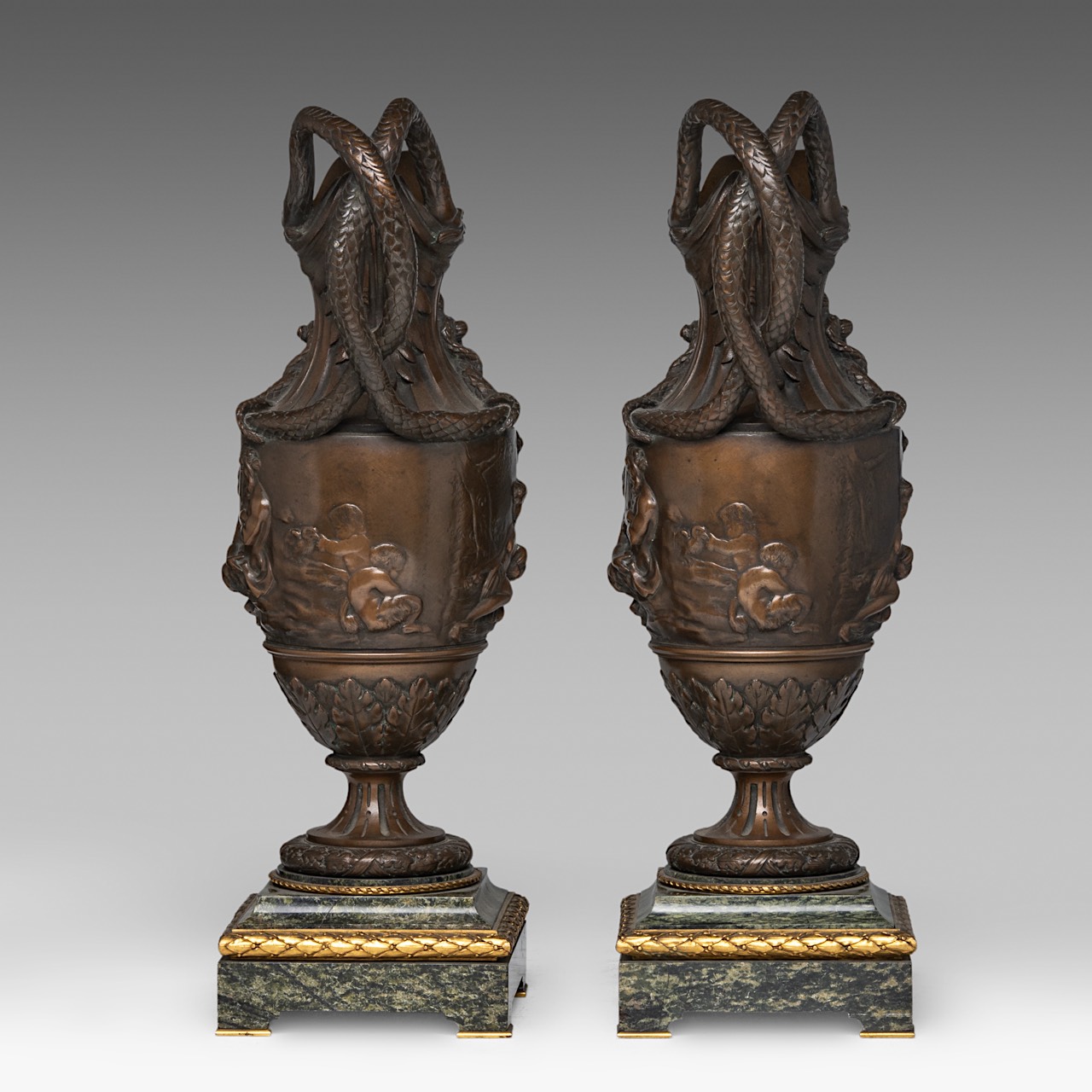 A pair of Neoclassical patinated bronze and marble ewers, in the Clodion manner, H 55 cm - Image 2 of 4