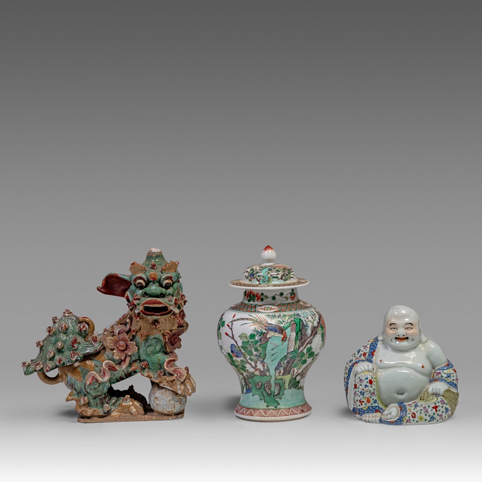 A Chinese famille verte covered baluster vase and a famille rose figure of smiling Budai, early 20th