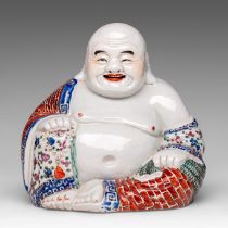 A Chinese famille rose enamelled biscuit figure of smiling a Budai, with an impressed mark, 20thC, H