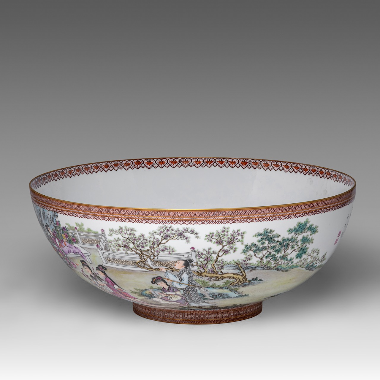A rare and large Chinese famille rose 'Beauties in a Garden' eggshell punch bowl, with a Yongzheng m - Image 2 of 9