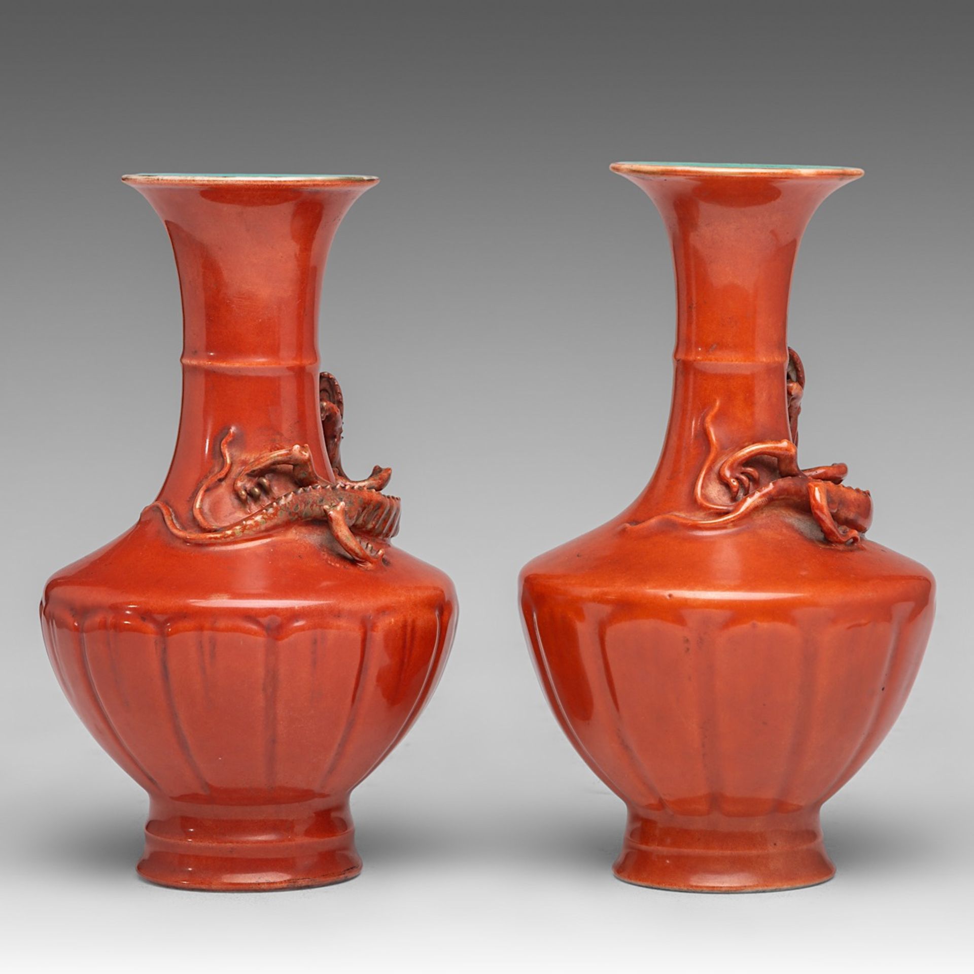 A similar pair of Chinese coral-red ground 'Dragon' vases, with a Qianlong mark, 19thC, H 19 - 19,5 - Bild 4 aus 6