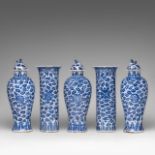 A complete set of Chinese blue and white floral decorated five-piece garniture vases, 19thC, H 30 (b