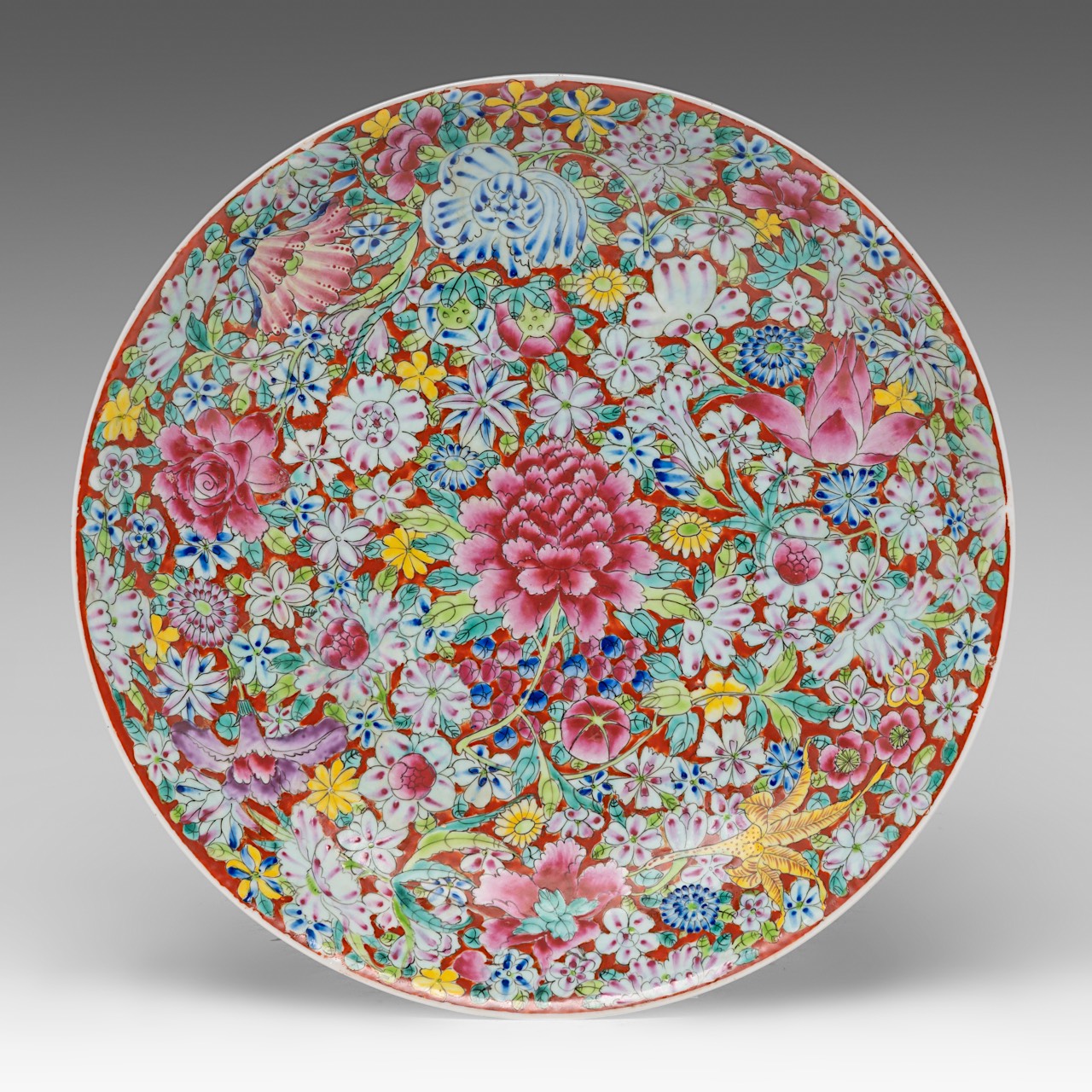 A Chinese famille rose 'Mille Fleurs' plate, with a Qianlong mark, 20thC, dia 38,5 cm - added a fami - Image 8 of 9