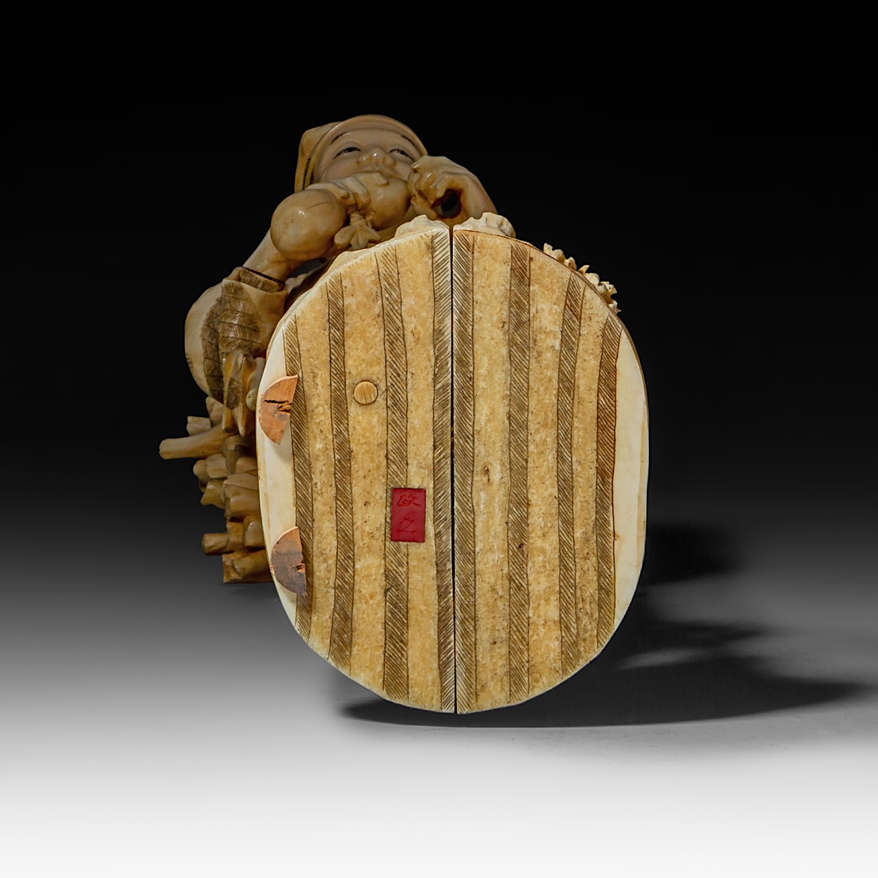 A large Japanese walrus ivory okimono of a wood gatherer drinking from a gourd flask, Meiji period ( - Image 9 of 10