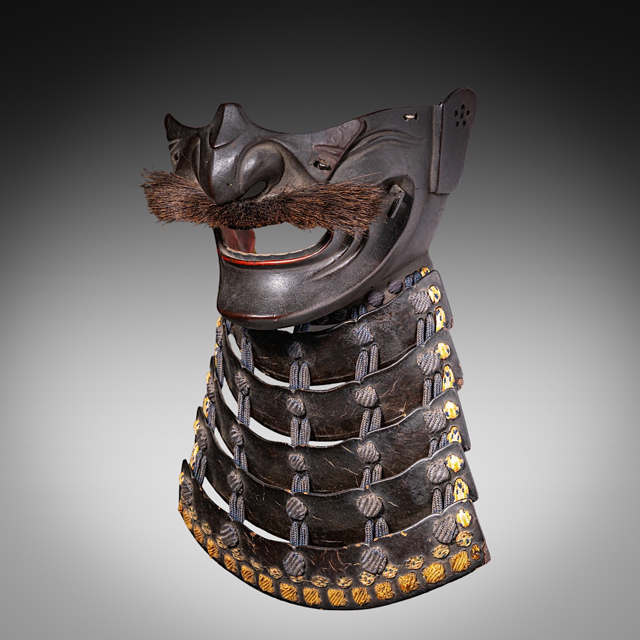 A Japanese late Edo/Meiji period (19thC) menpo (face guard for samurai armour), metal, leather and l - Image 2 of 5