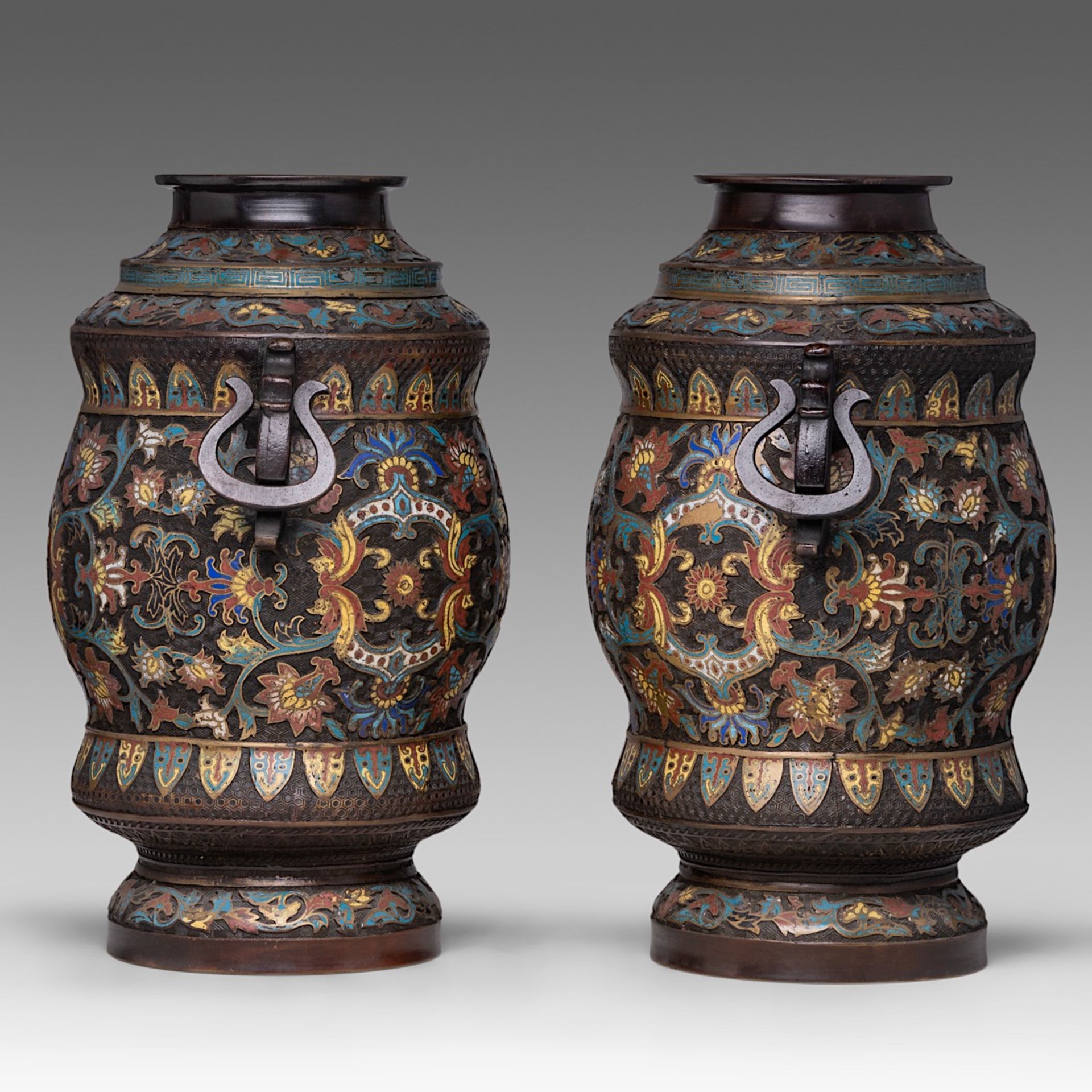 A pair of Japanese champleve enamelled bronze 'Scrolling Lotus' vases, paired with stylised dragon h - Image 4 of 6
