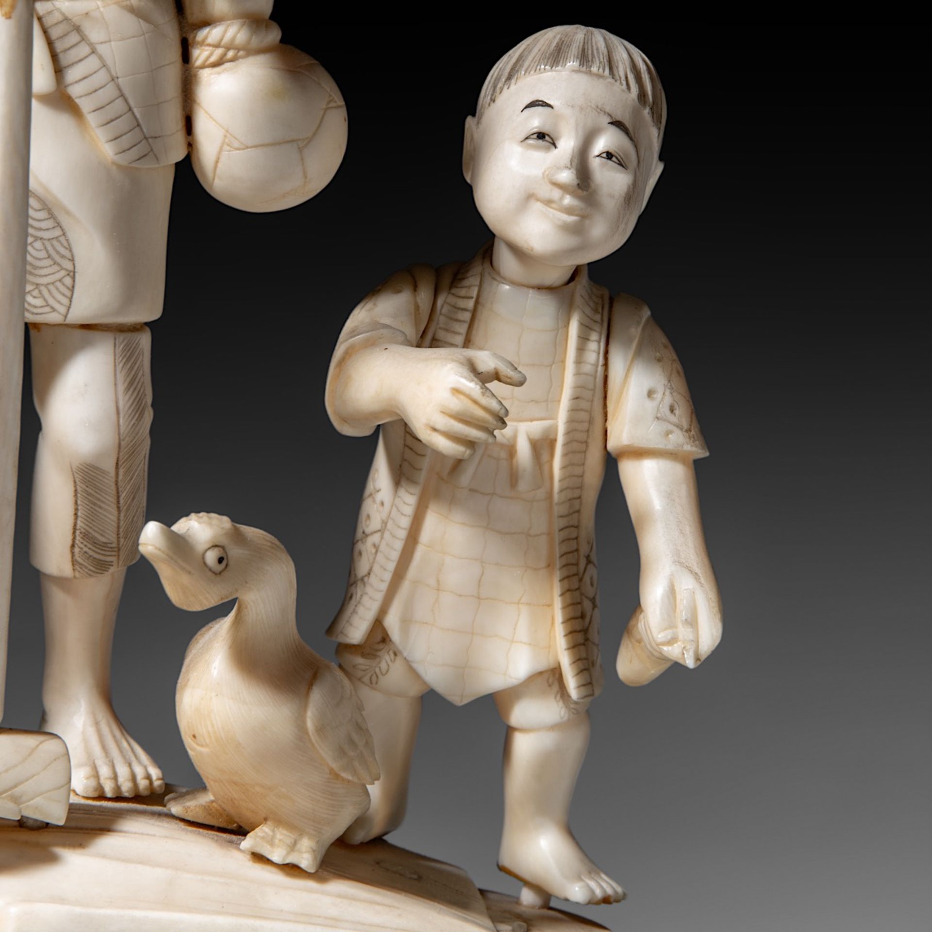 A Japanese hippo and walrus ivory okimono of a family fishing, Showa period (1926-1989), H 20 cm - W - Image 11 of 11