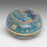 A Chinese cloisonne enamelled 'Garden' round box and cover, with a Qianlong mark, dia 10,4 - H 6,8 c