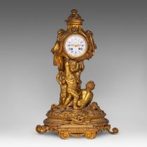 A Neoclassical gilt bronze mantle clock with putti holding the clock case, Lerolle, Paris, H 61 cm