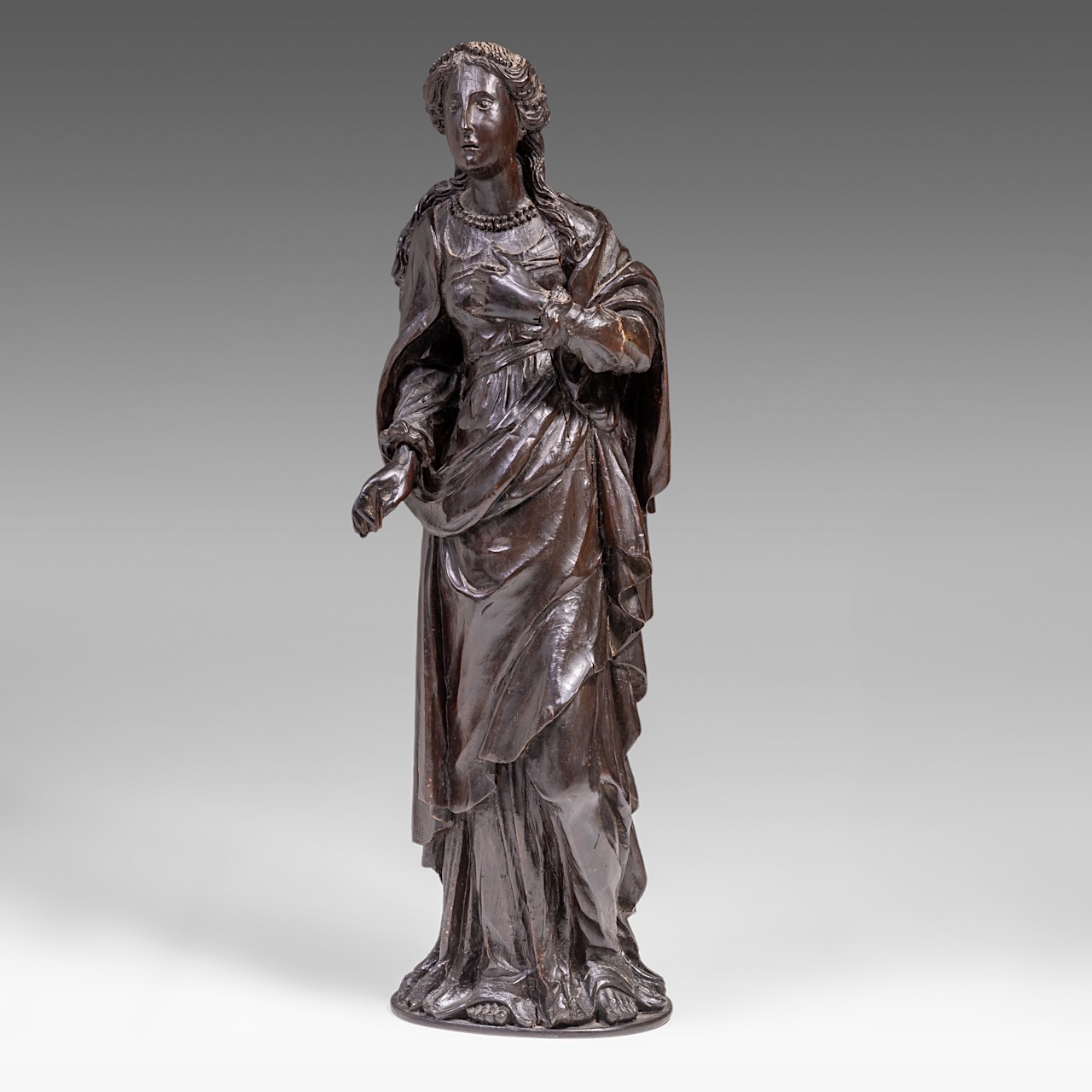 A carved wooden sculpture of Saint Barbara, on a matching console, H 139 cm (total) - Image 5 of 10