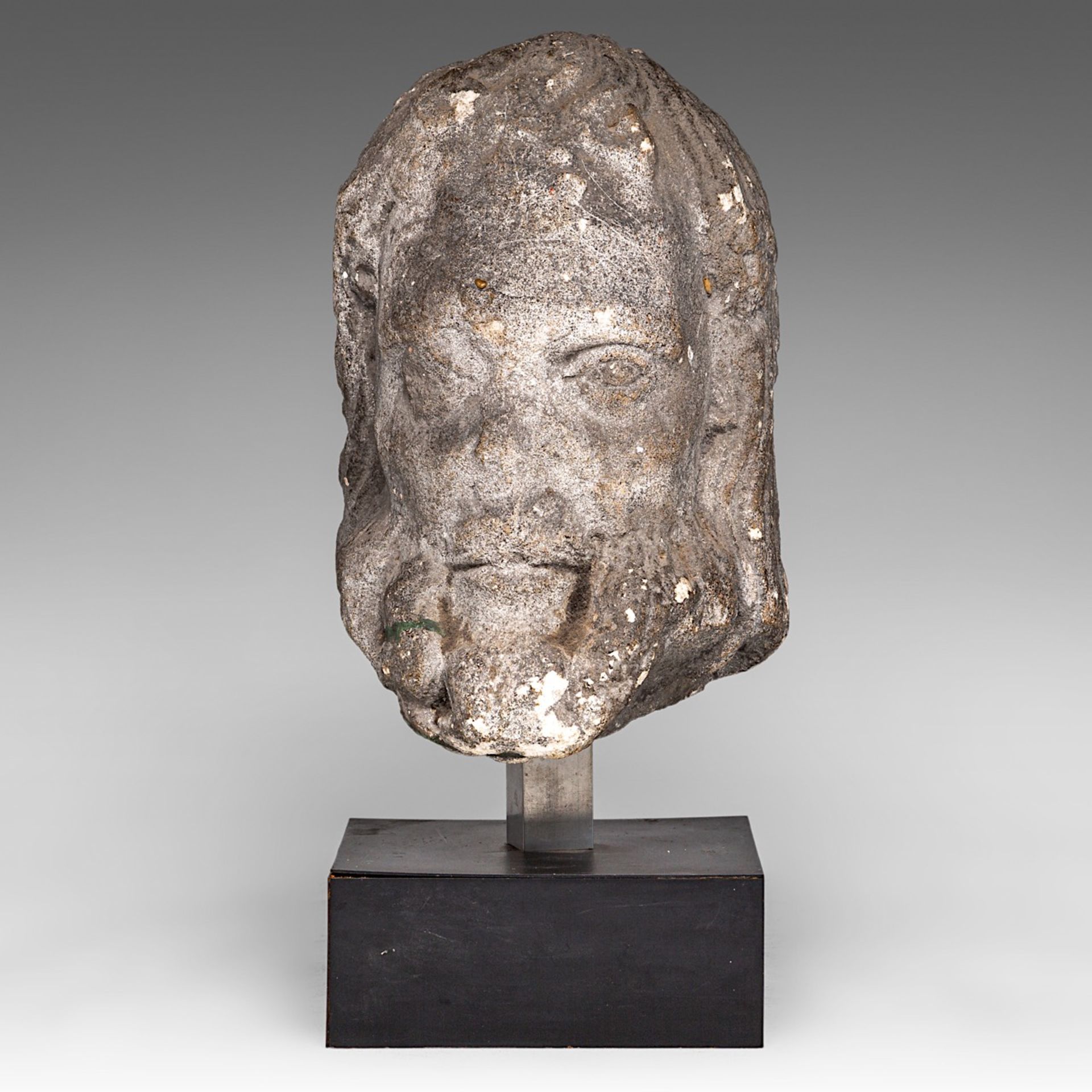 The head of an apostle in French limestone, in the 14thC manner but possibly later, H 28 cm