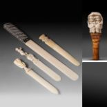 A collection of two European ivory letter openers, a ditto walrus ivory opener, a ditto page-turner,