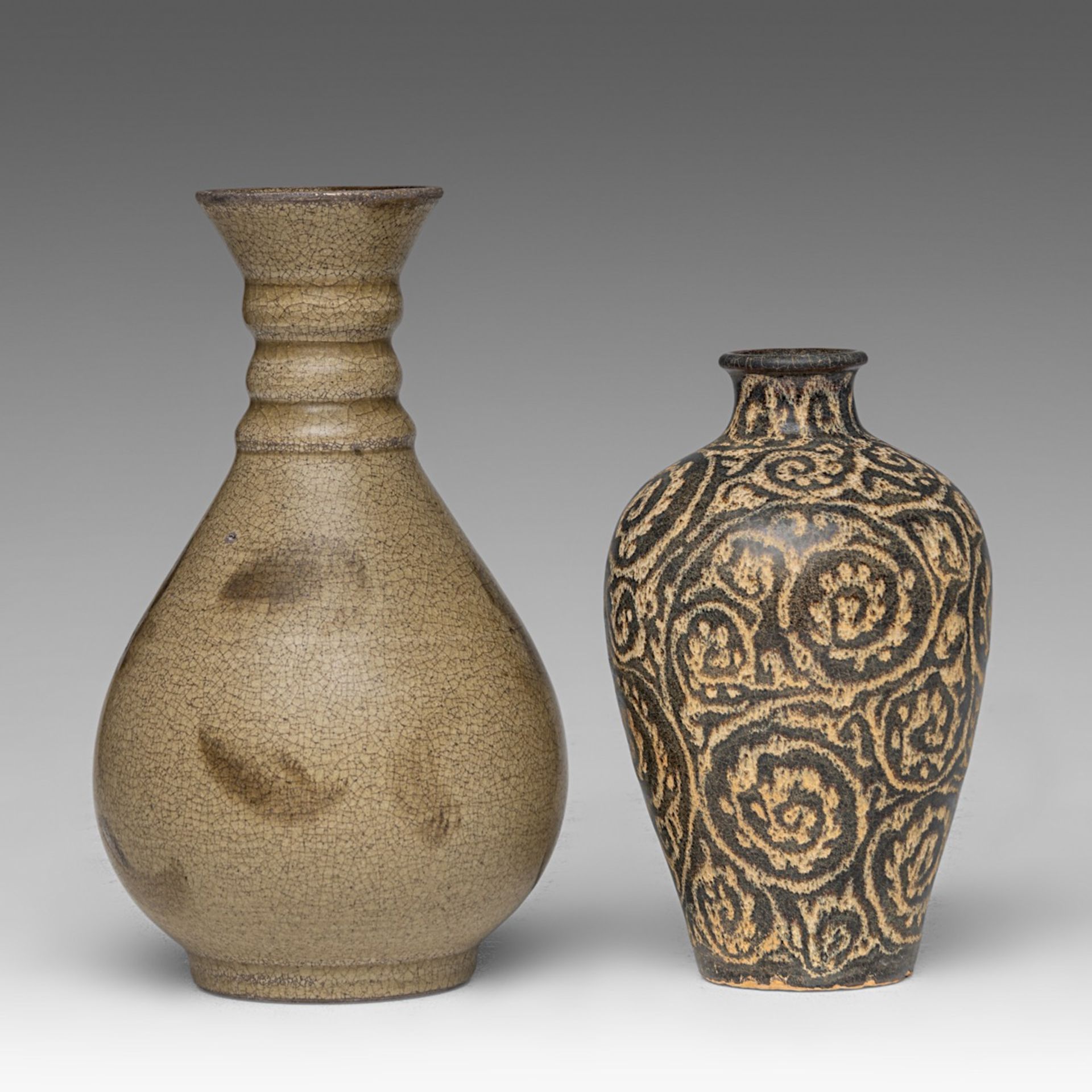 A Chinese floral decorated brown ground Jizhou ware vase, H 16,5 - added a similar type pear-shaped