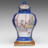 A fine Chinese famille rose and blue ground 'Beauties in a Chamber' vase and cover, Republic period,
