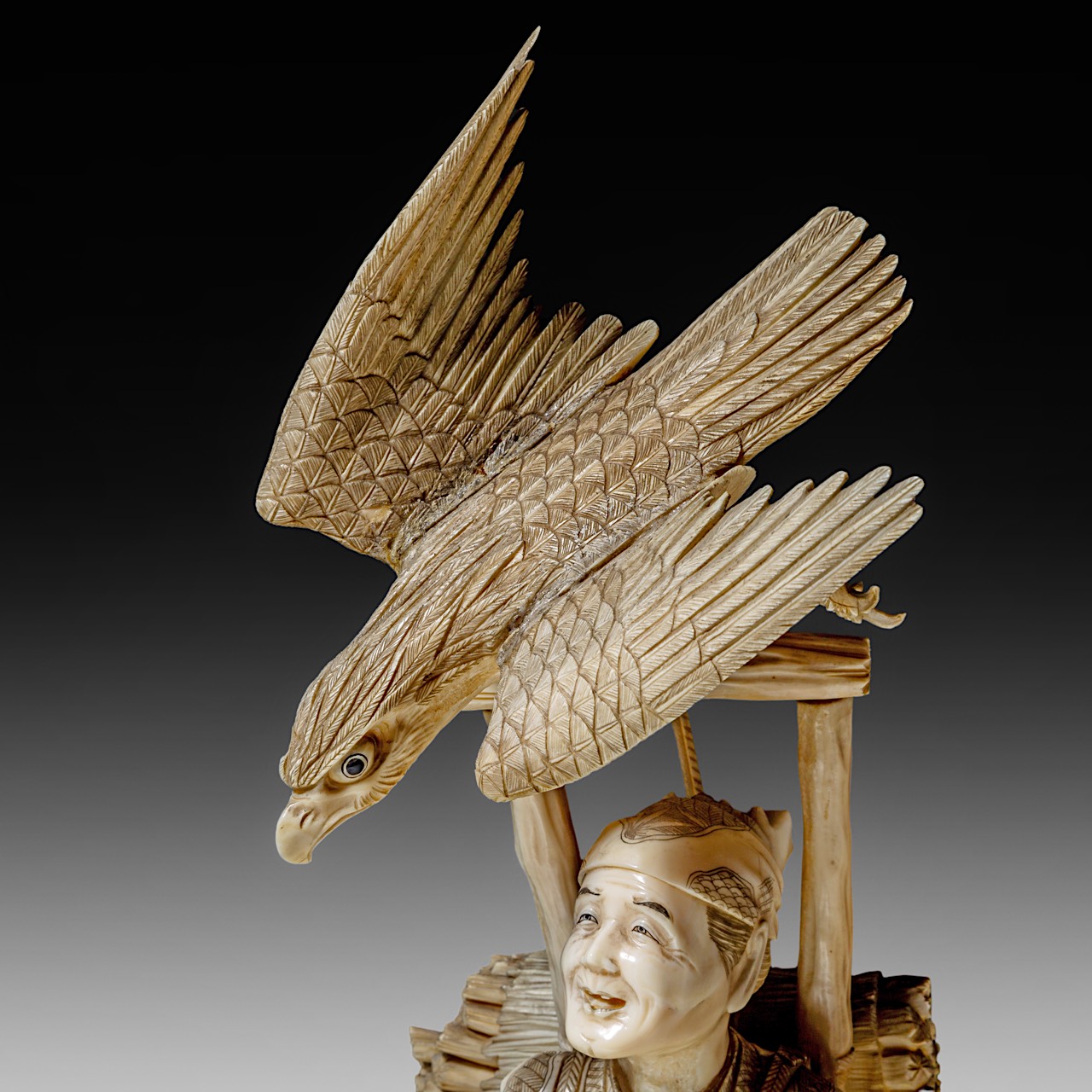 A large and fine Japanese walrus ivory okimono of a falconer and his son watching an eagle, Meiji pe - Image 13 of 13