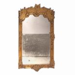 A Rococo giltwood trumeau mirror, mid 18thC 179 x 97 cm. (70.4 x 38.1 in.)