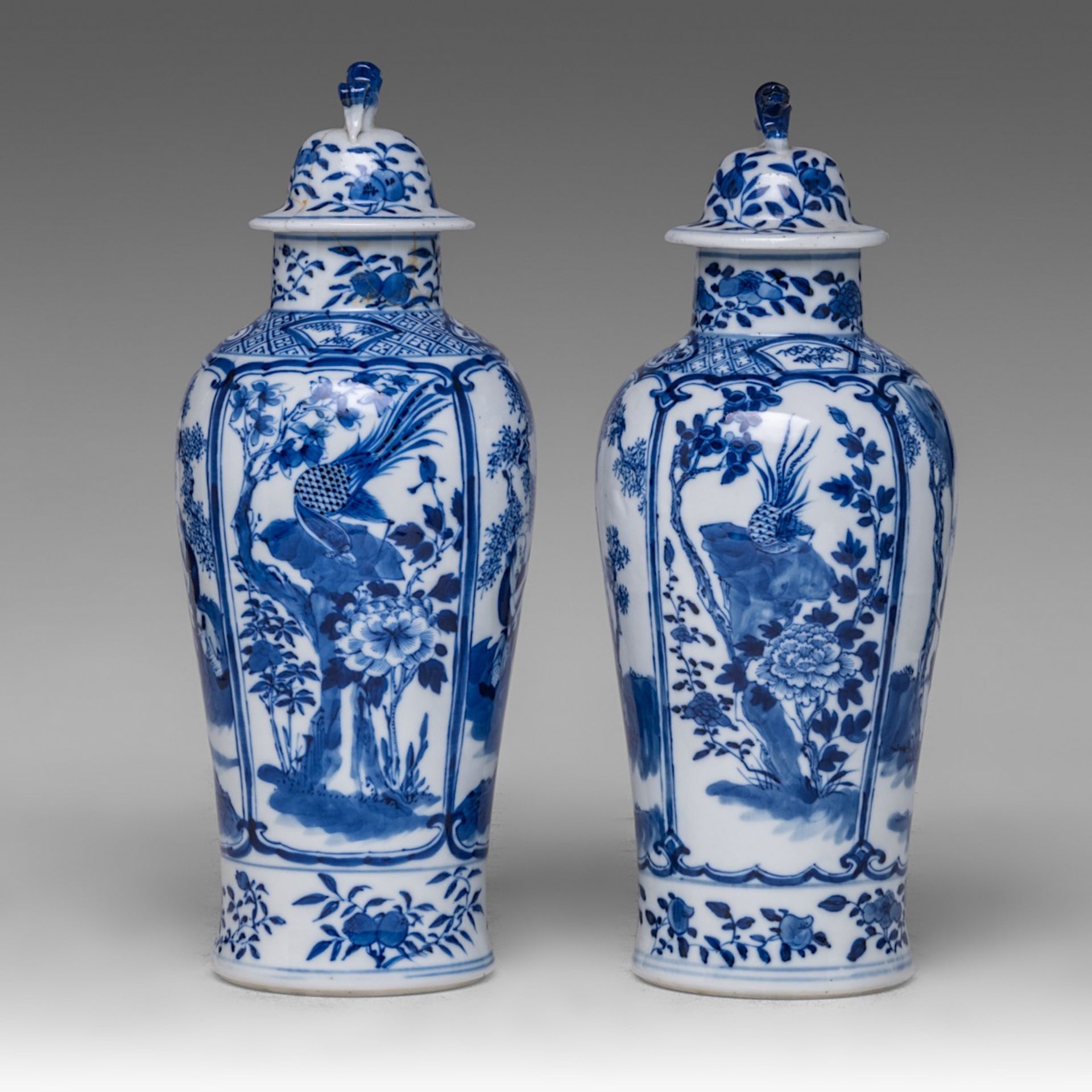 A near pair of Chinese blue and white 'Li Tieguai' lidded vases, with a Kangxi mark, 19thC, Total H - Bild 4 aus 8