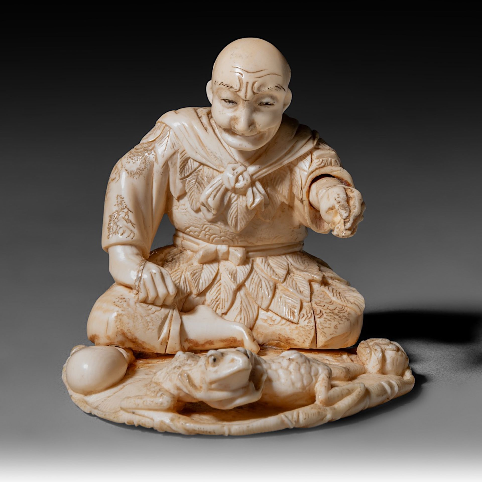 Two Japanese Meiji-period (1868-1912) ivory okimono; one depicts a man rowing a raft while a child s - Image 12 of 19