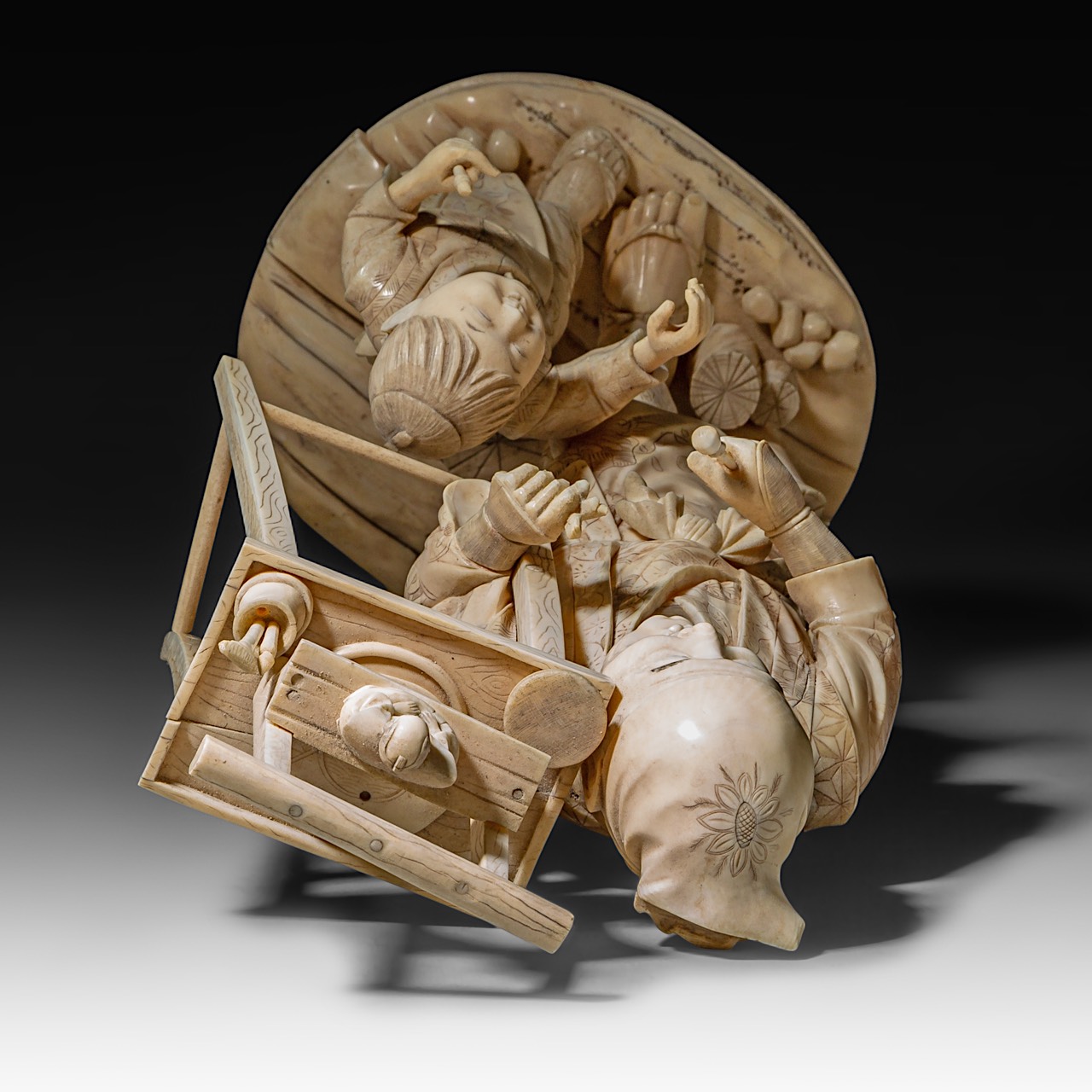 A large Japanese walrus ivory okimono of an artisan with his son, Meiji period (1868-1912), H 46,5 - - Image 9 of 13