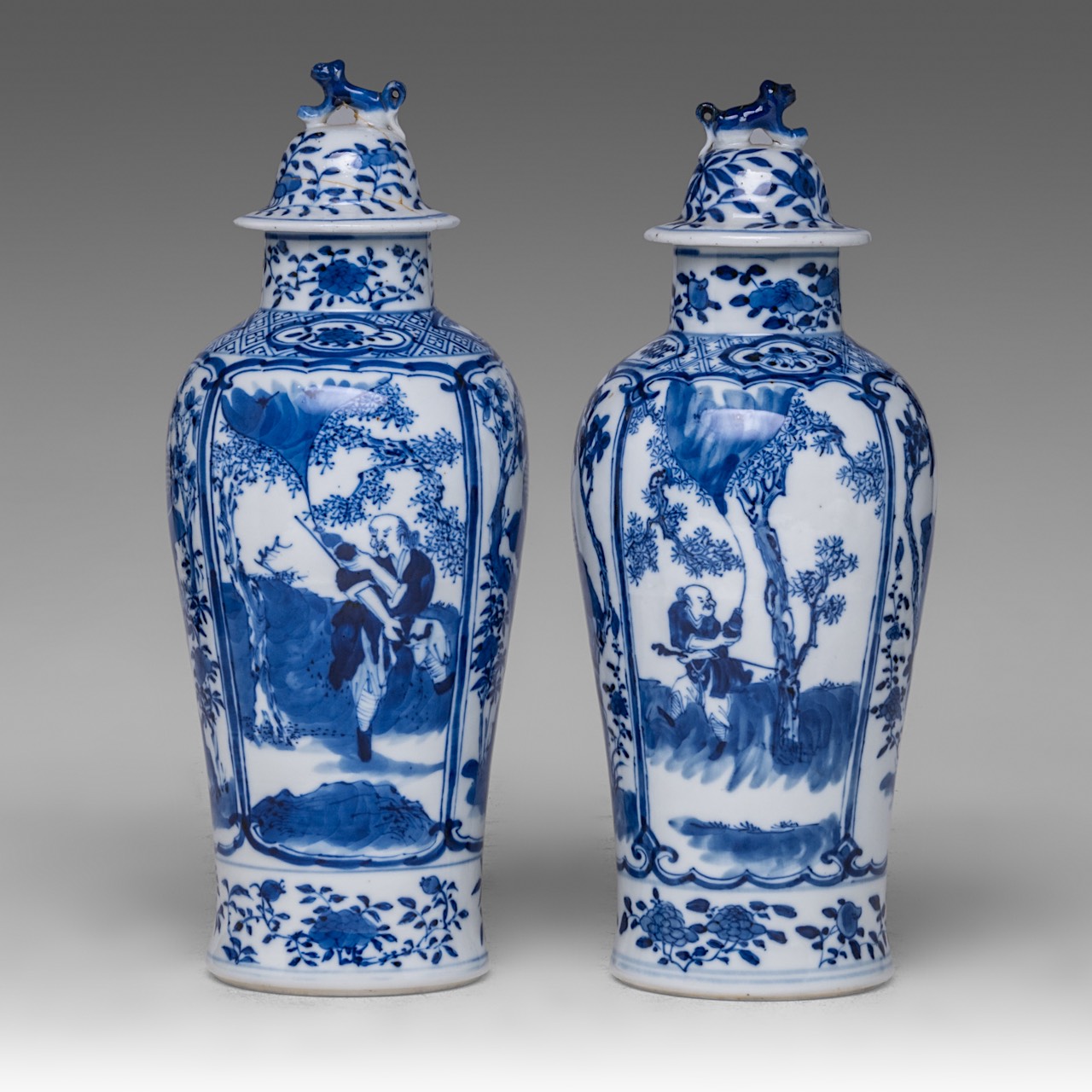 A near pair of Chinese blue and white 'Li Tieguai' lidded vases, with a Kangxi mark, 19thC, Total H - Image 3 of 8