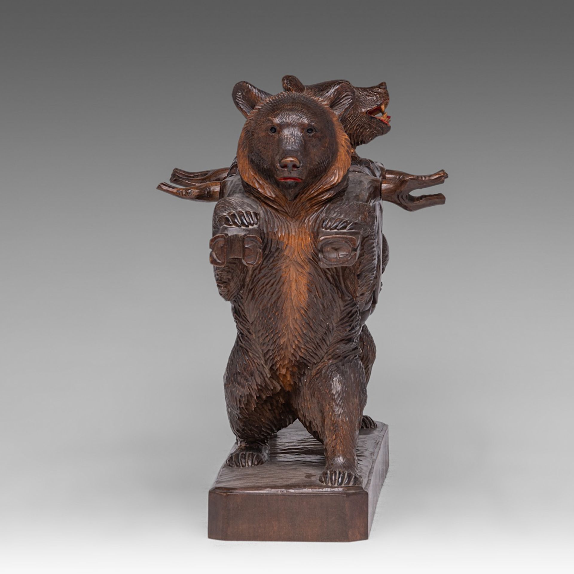 A Black Forest carved wooden liquor stand with two bears carrying the decanter and six glasses, H 4 - Image 4 of 10