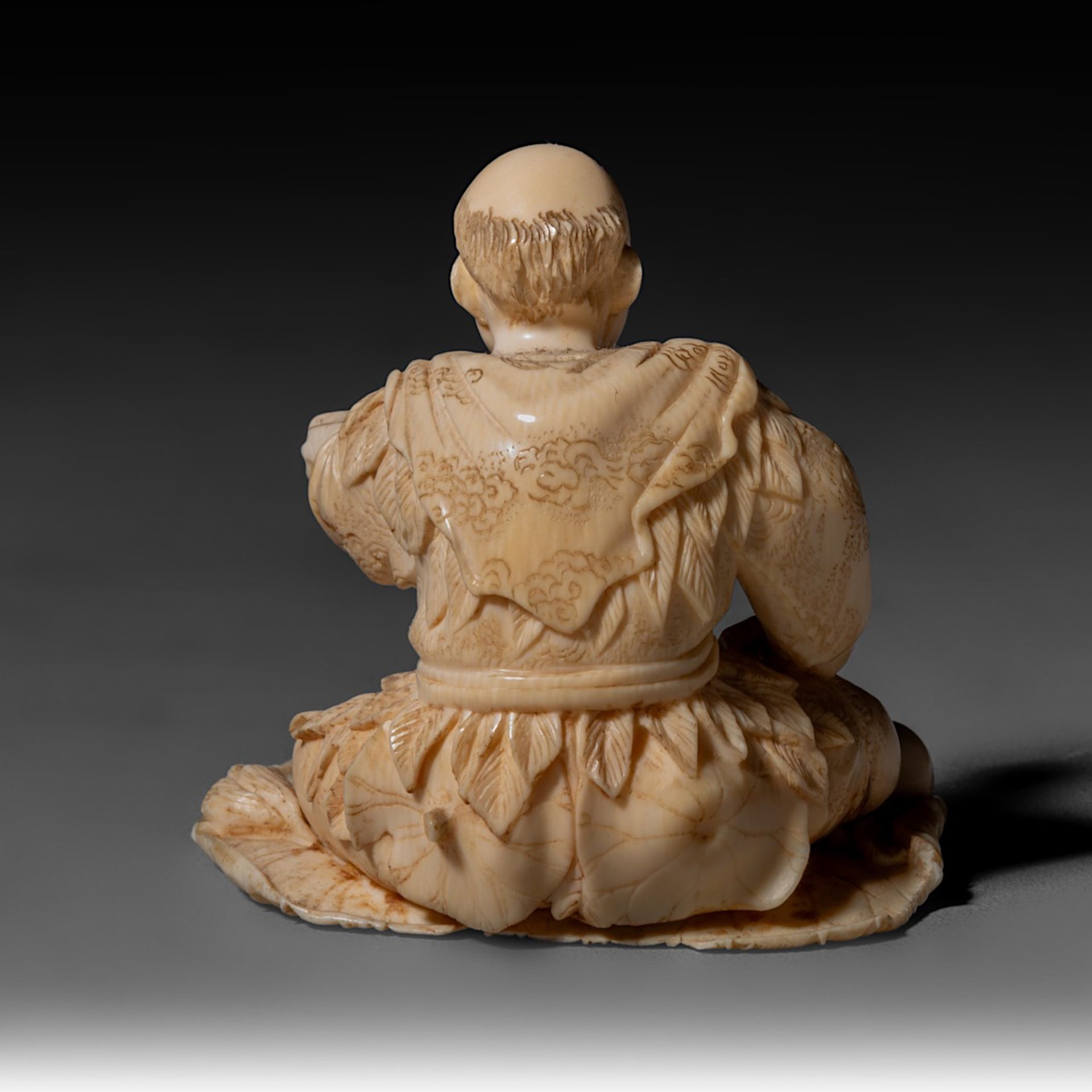 Two Japanese Meiji-period (1868-1912) ivory okimono; one depicts a man rowing a raft while a child s - Image 16 of 19