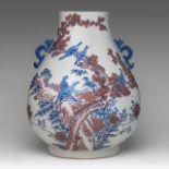 A Chinese copper-red and underglaze blue 'One Hundred Birds' hu vase, paired with dragon handles, wi