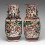 A pair of Chinese famille rose 'Battle Scene' Nanking ware vases, late 19thC, H 46 cm