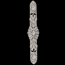 An Art Deco 18ct yellow and white gold brooch set with diamonds, L 8,8 cm, weight: 10,9 g