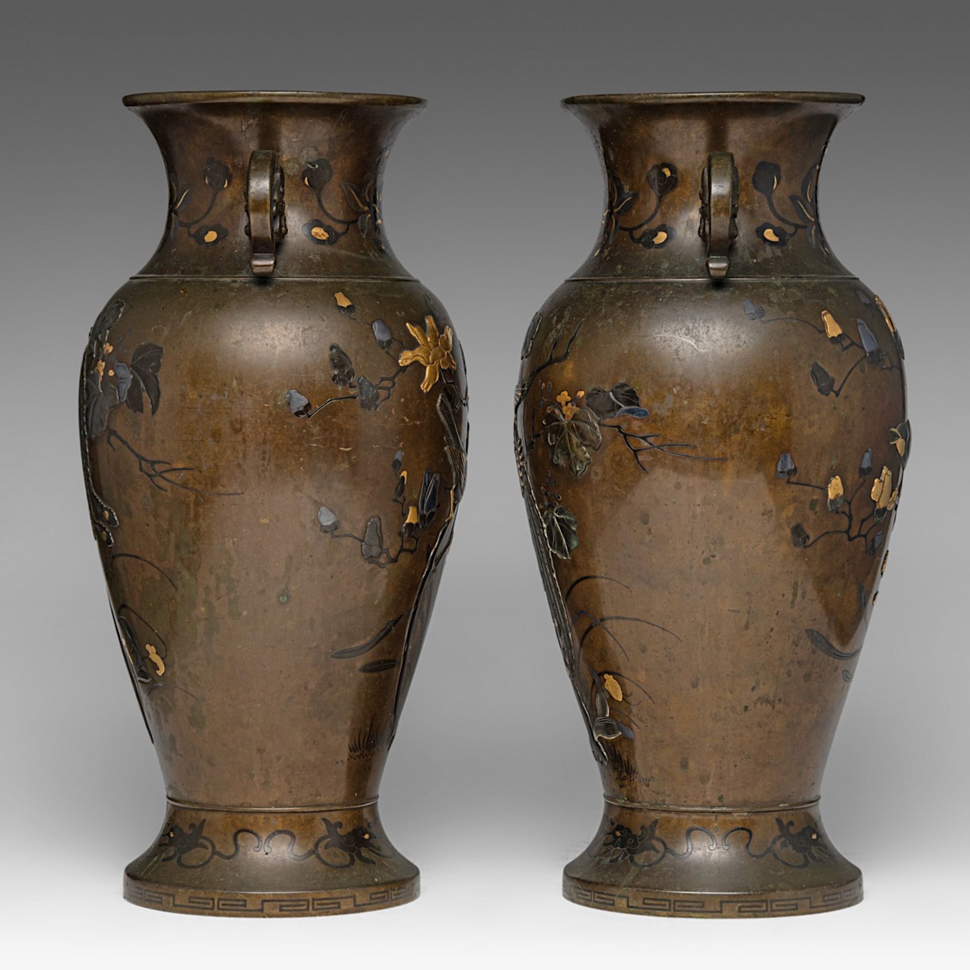 A pair of Japanese bronze 'Phoenix' vases with gilt details, Meiji period (1868-1912), both H 41,5 c - Image 2 of 6