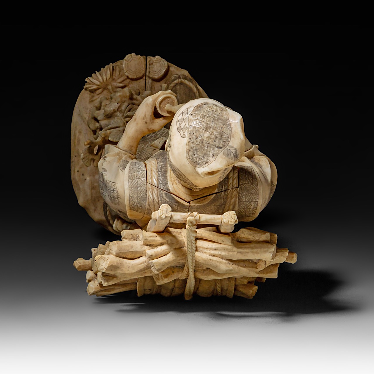 A large Japanese walrus ivory okimono of a wood gatherer drinking from a gourd flask, Meiji period ( - Image 8 of 10