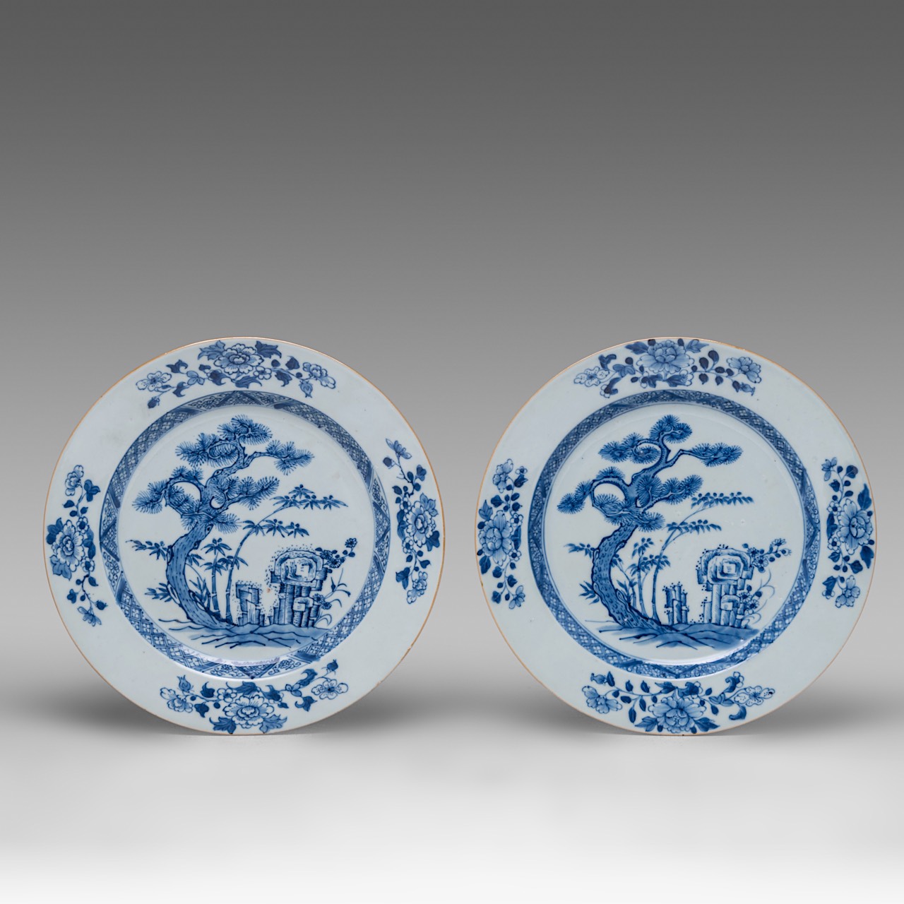 A series of four Chinese blue and white 'Bamboo below Pine' dishes and plates, 18thC, dia 22,5 - 28, - Image 10 of 12