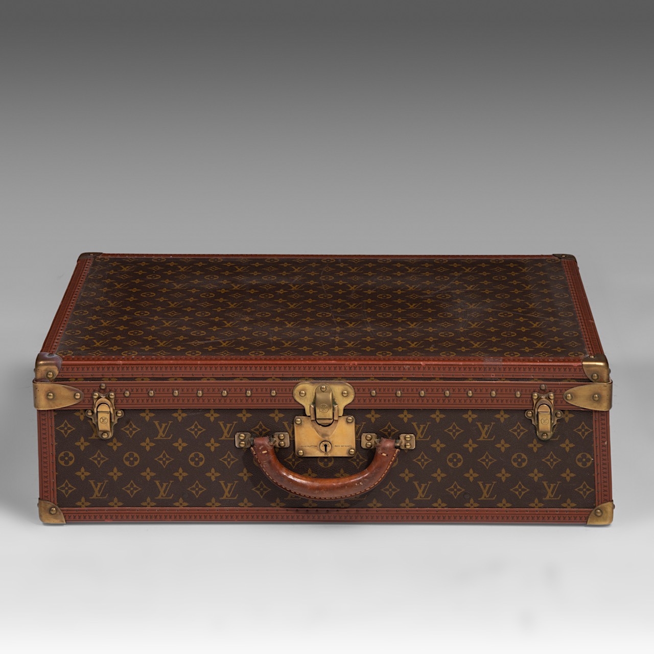 A vintage Louis Vuitton coffer, Model Alzer 70, 47 - 70 - 21,5 cm - Image 6 of 9