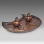 A Japanese writing set, with an inkwell, sand pot and penholder on a bronze crescent shaped-plate, M