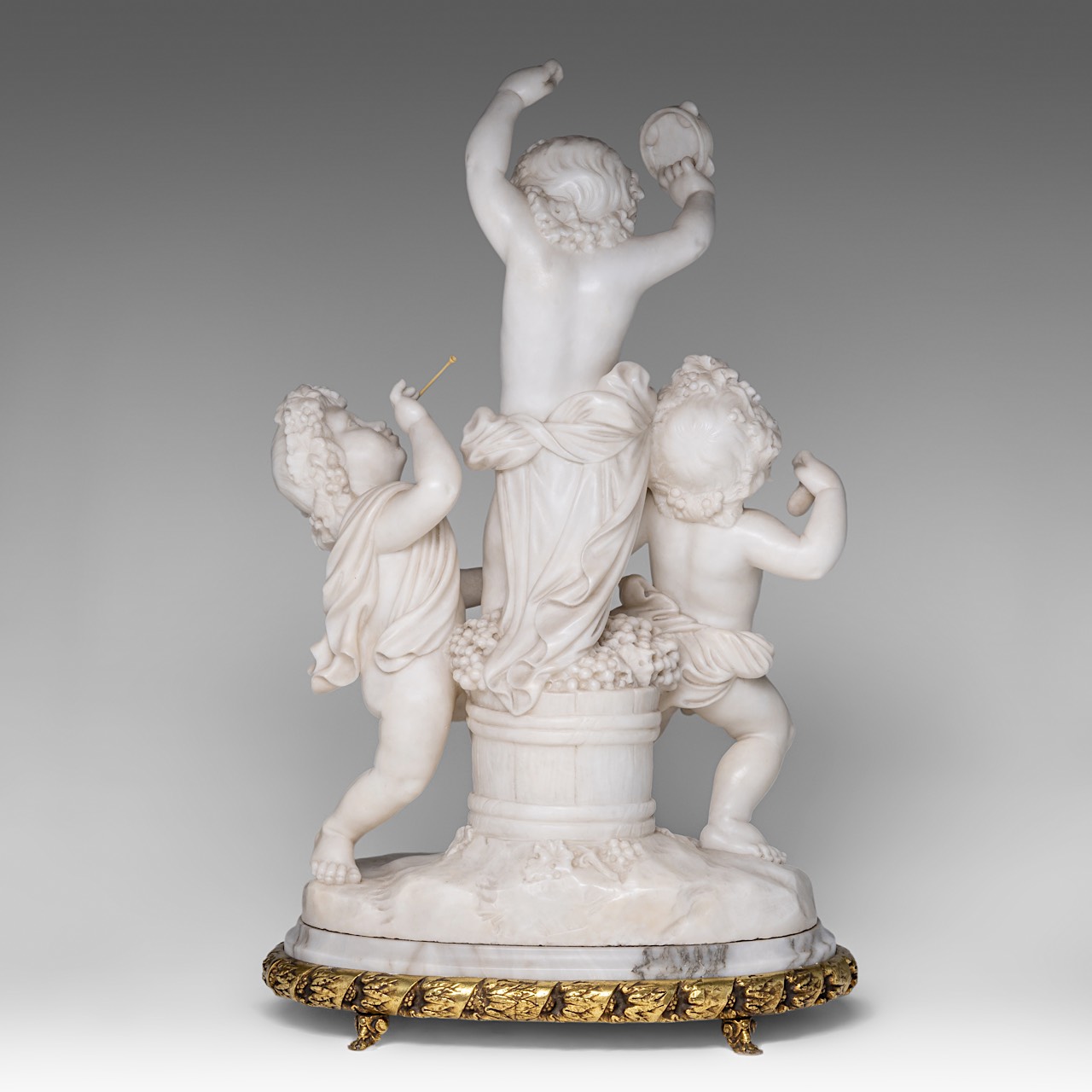 A charming alabaster group of playing putti, on a gilt brass stand, H 68 cm (total) - Image 4 of 9