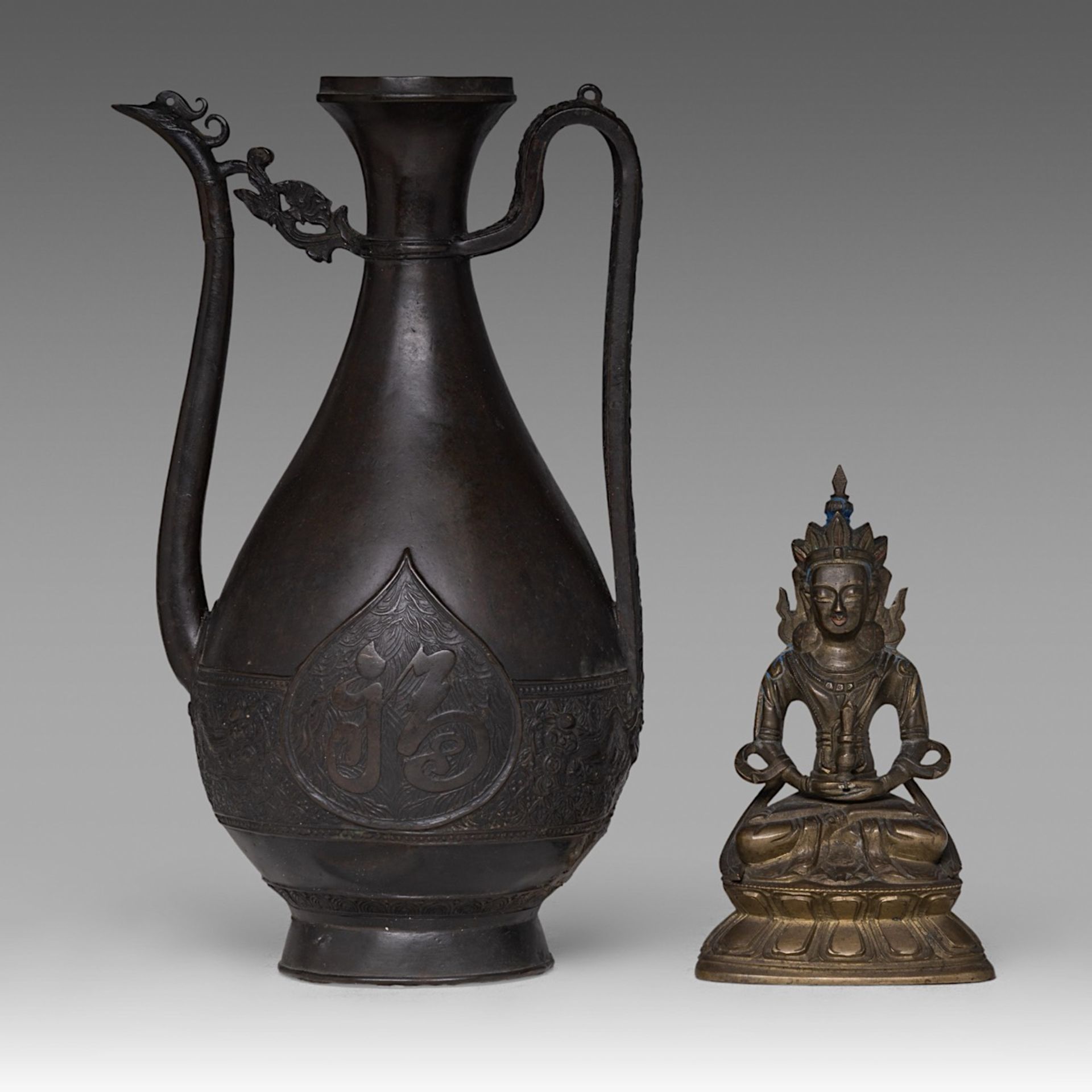 A Chinese bronze figure of Buddha Amitayus, 19thC, H 16,5 cm - added a Chinese Ming bronze 'Fu' wine