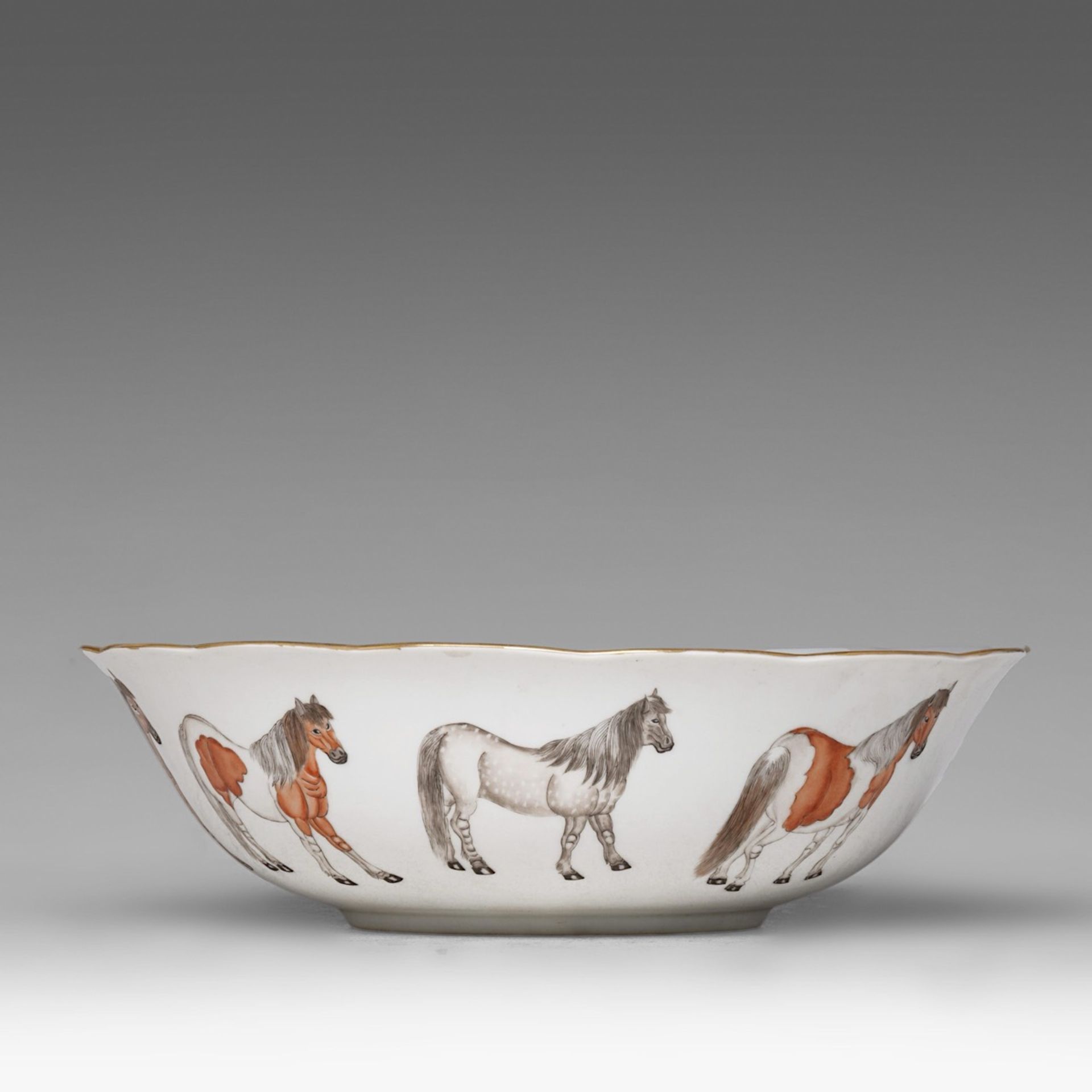 A Chinese polychrome 'Eight Horses' deep plate, Tongzhi mark and of the period, dia 25,5 cm