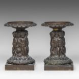 A pair of cut crystal coupes on patinated bronze figural stands, in the Wiener Werkstatte manner, H