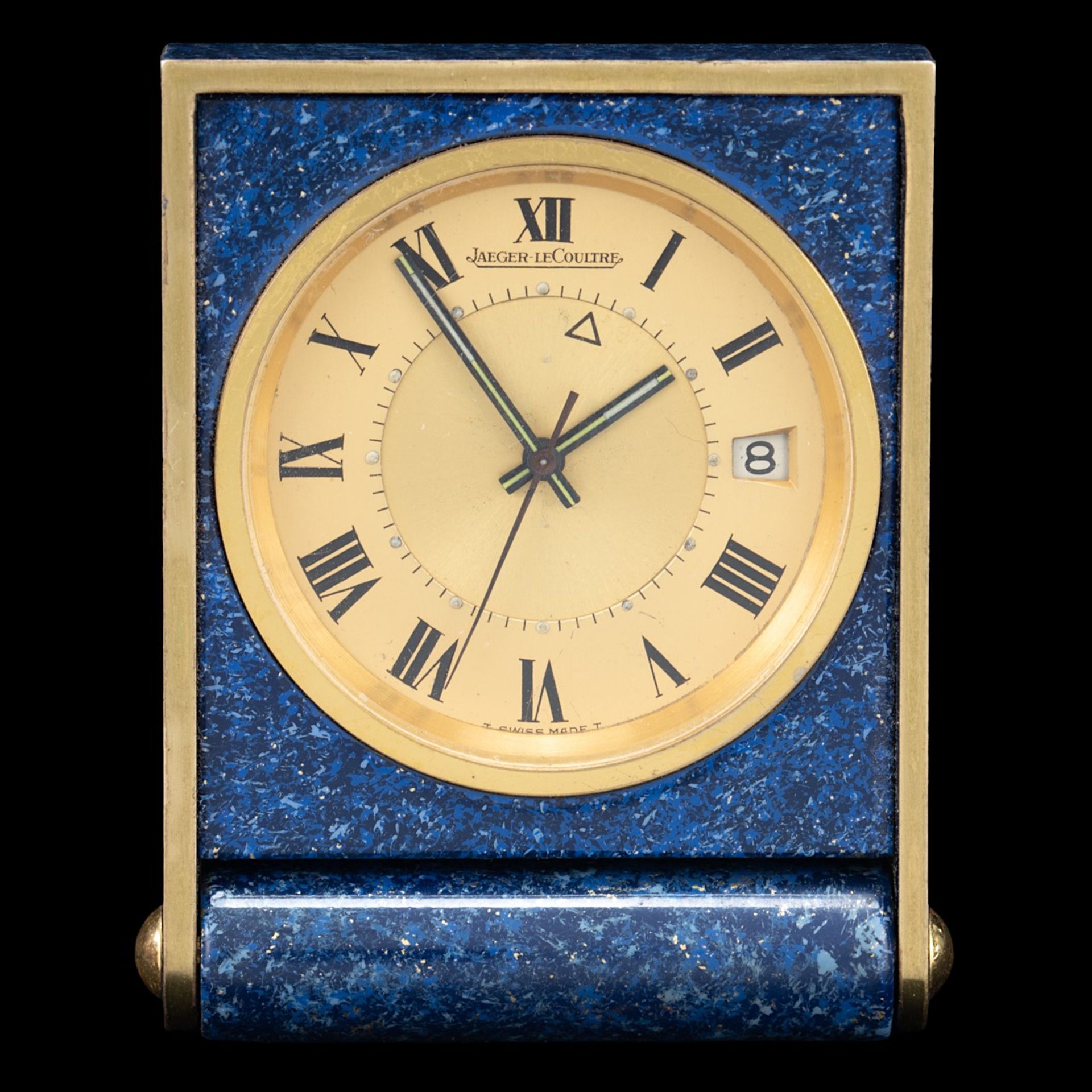 A Jaeger-LeCoultre folding travel alarm clock, W 4,3 - H 5,2 - total thickness 1,3 cm